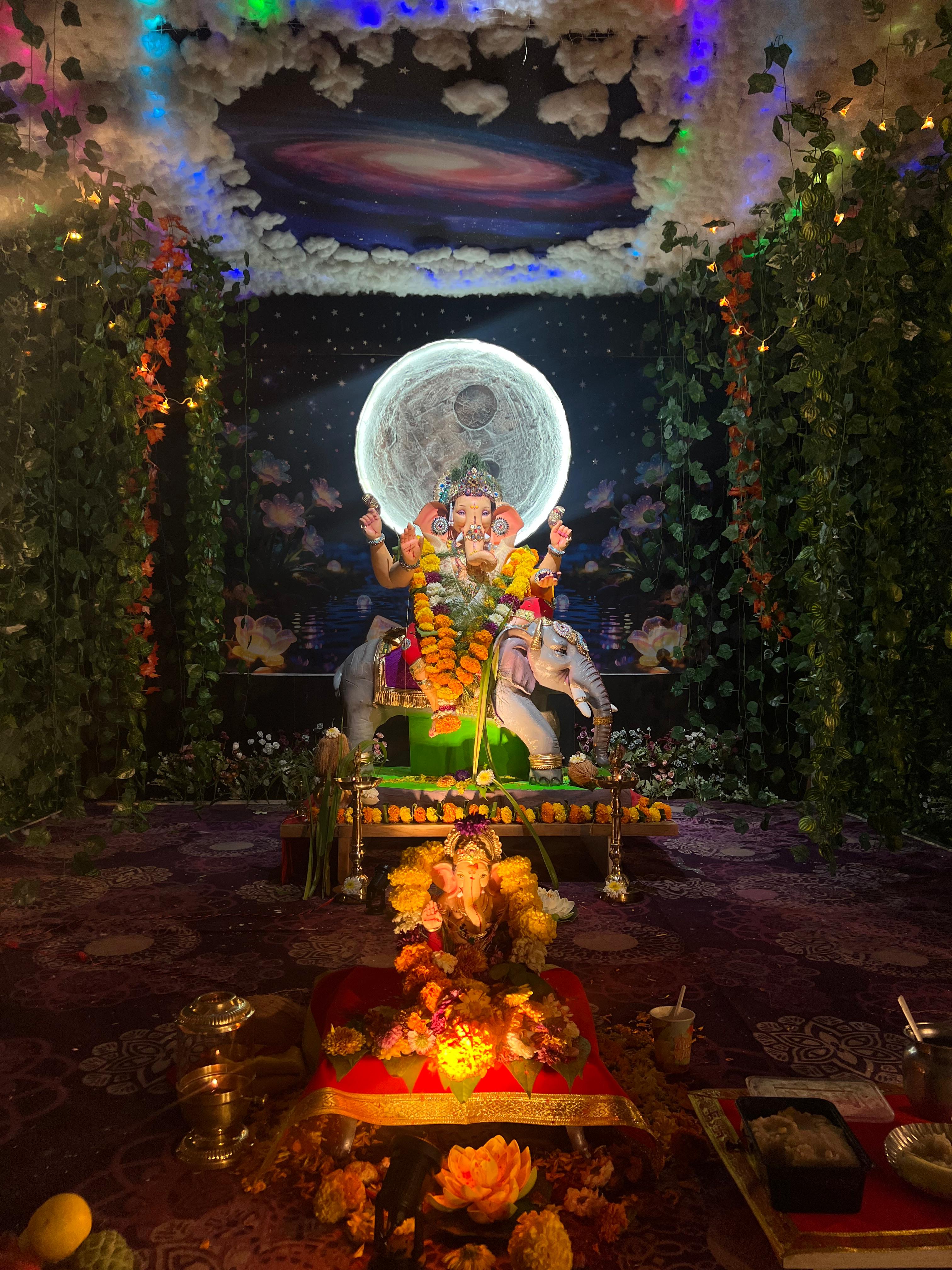 Sai Vista Ganpati Bappa 2026, with the moon and galaxy decoration and flower garlands